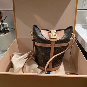  Louis Vuitton Monogram Canvas Duffle Bucket Bag with vachetta leather trim.
